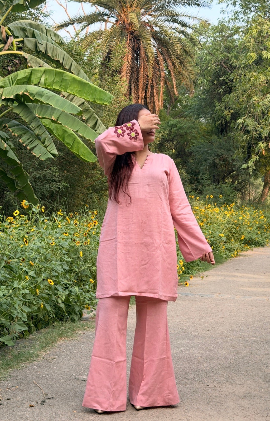Bloom & Blush 2-Piece Set — Pure Pink Linen Kameez with Flower Patch Cuffs, Scallop Neckline & Bell Bottom Trousers | ALBABS