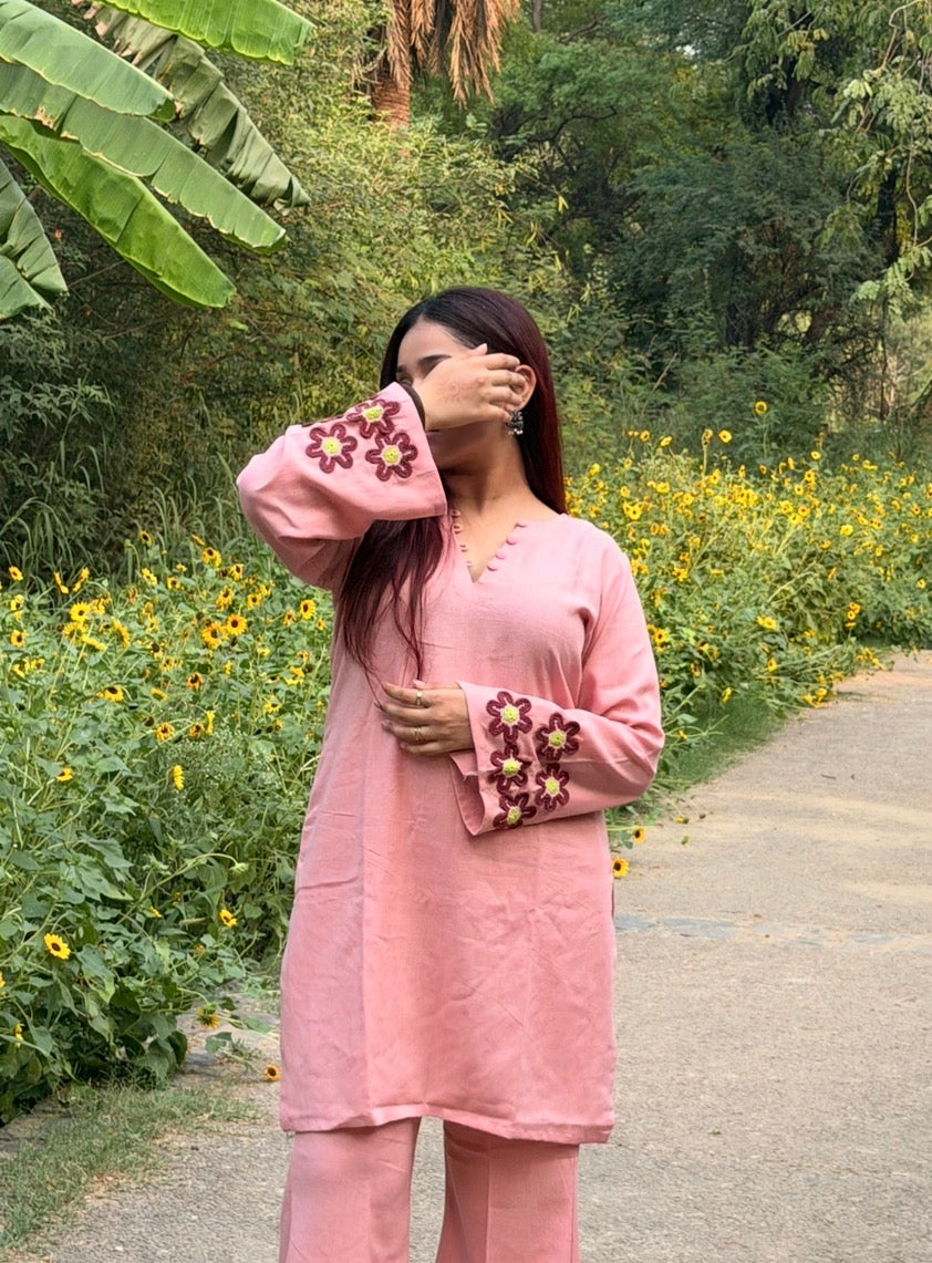 Bloom & Blush 2-Piece Set — Pure Pink Linen Kameez with Flower Patch Cuffs, Scallop Neckline & Bell Bottom Trousers | ALBABS